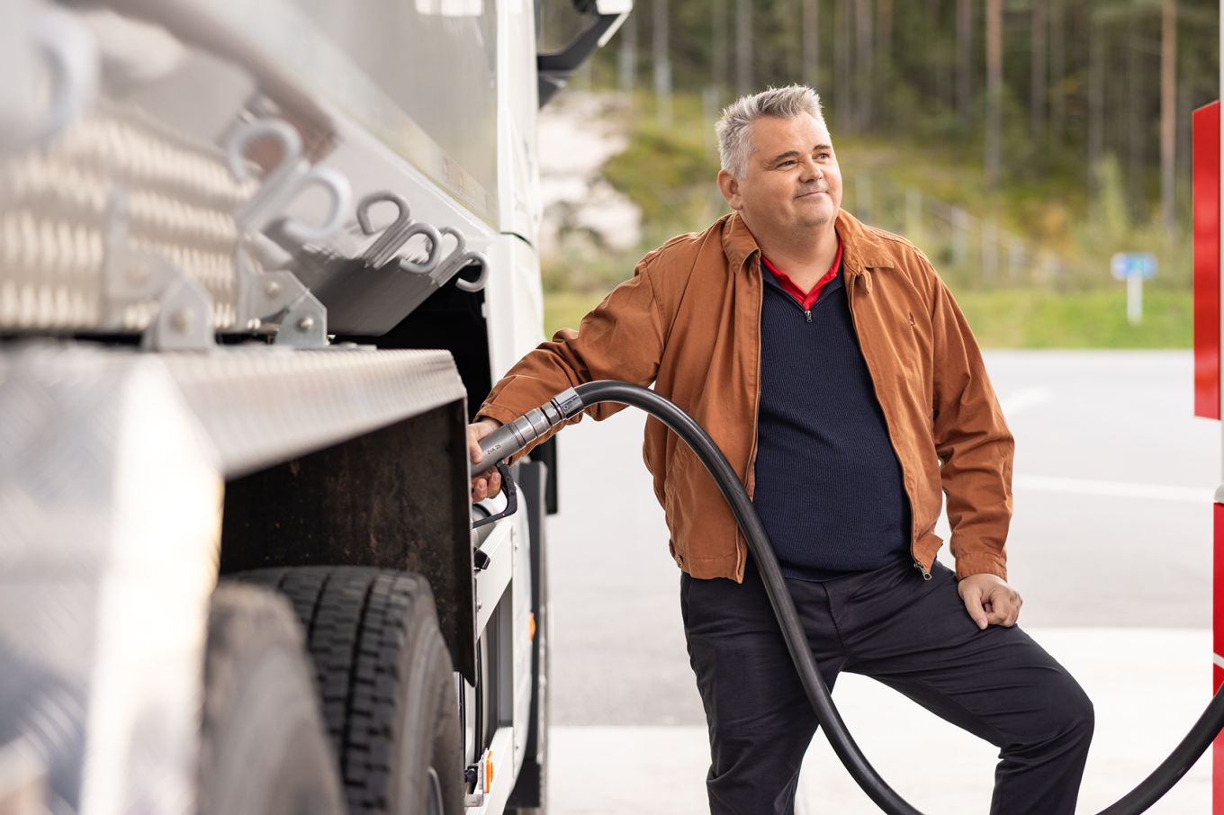 man fueling his truck at Circle K